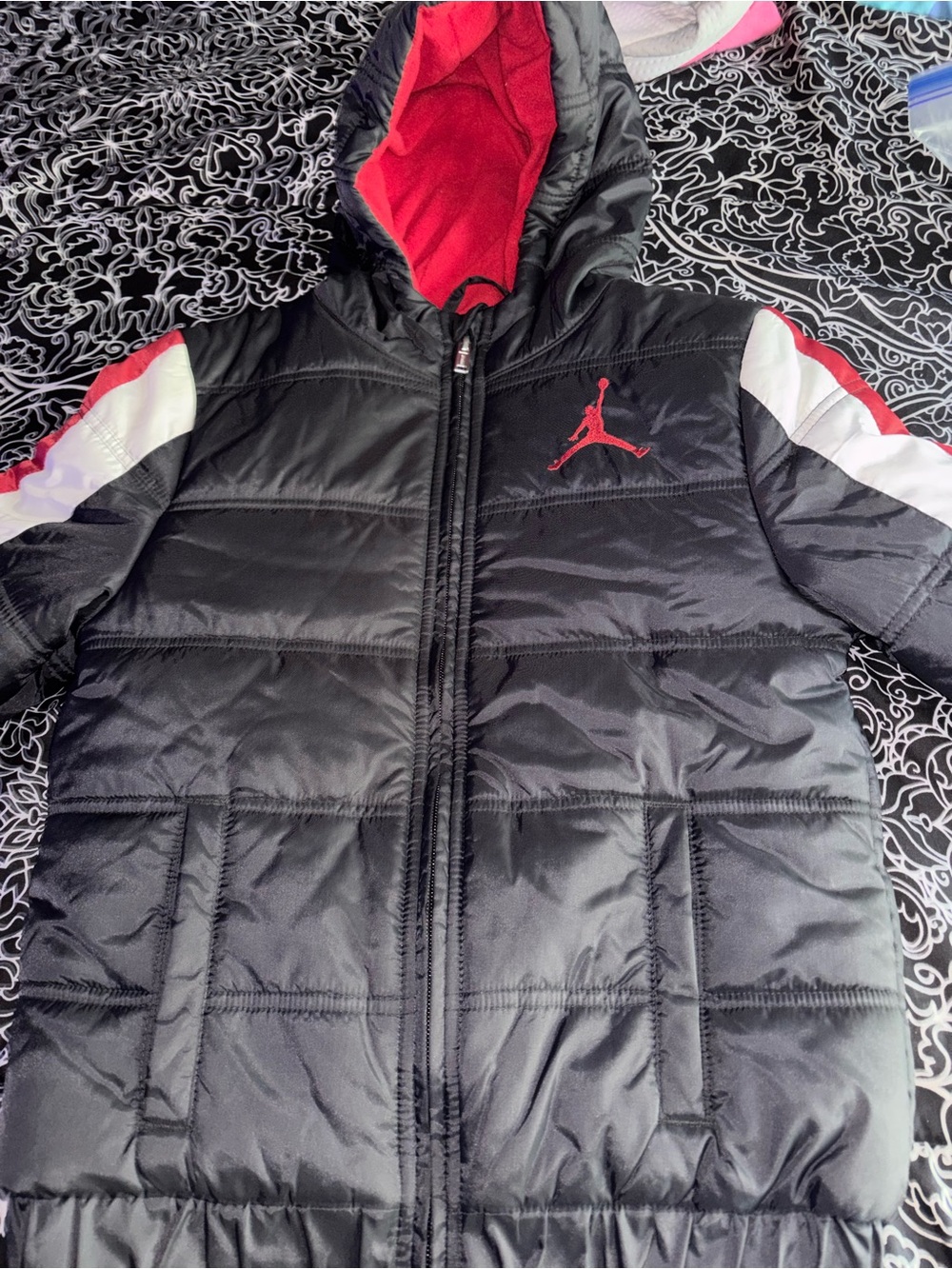 Jordan Black Puffer Jacket with Red Hood & White Sleeve Accents